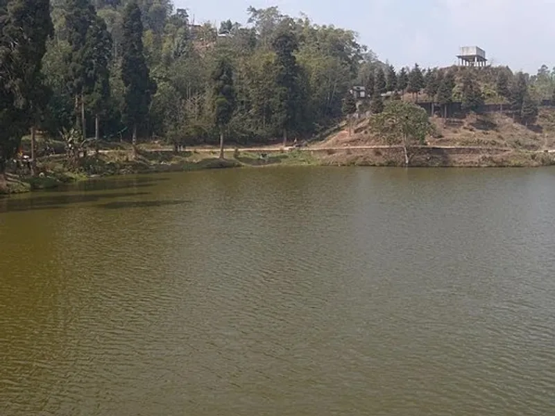 Senchal Lake, Darjeeling - A Scenic Natural Retreat Senchal Lake in Darjeeling, a tranquil water reservoir surrounded by lush greenery and scenic views, offering a perfect spot for relaxation and nature lovers.