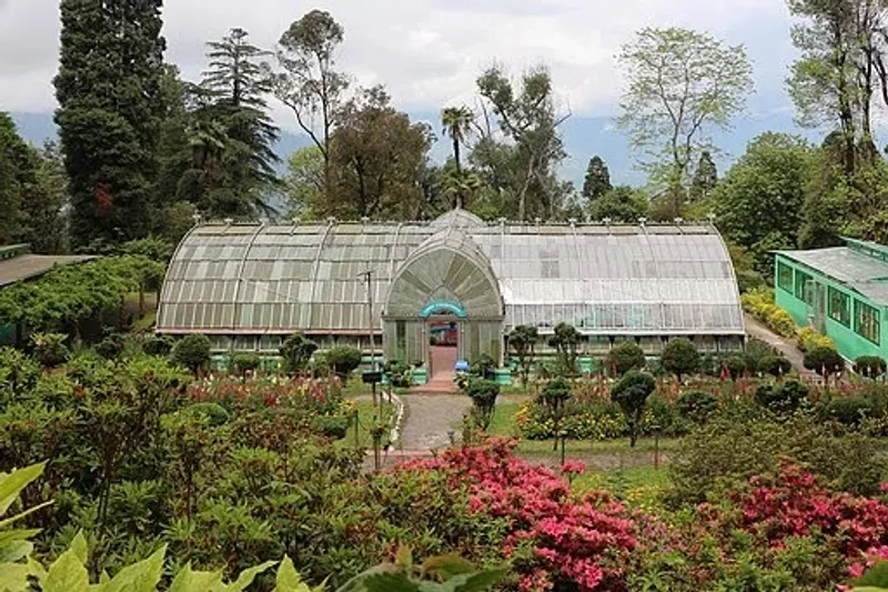 Darjeeling Botanical Garden - A Peaceful Nature Escape Darjeeling Botanical Garden, a serene haven of rare plants, vibrant flowers, and lush greenery, offering a peaceful escape amidst nature's beauty.