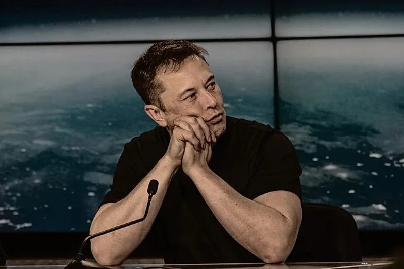 Elon Musk at a Press Conference - Visionary Insights Elon Musk speaking at a press conference, sharing his visionary ideas and insights on technology, innovation, and the future of business.